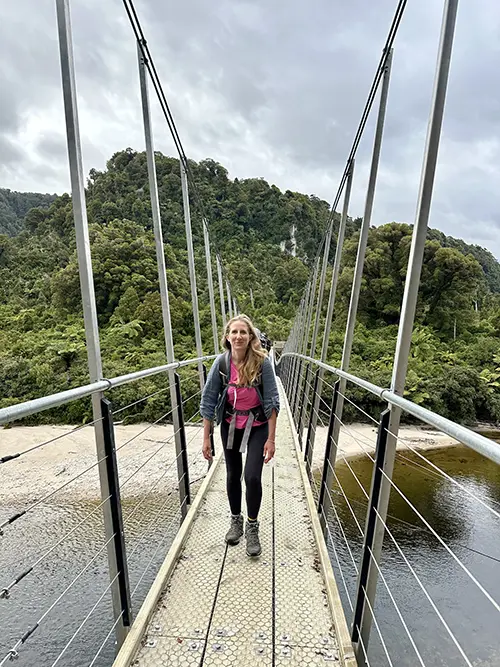 Emily crossing new Heaphy River Swingbridge