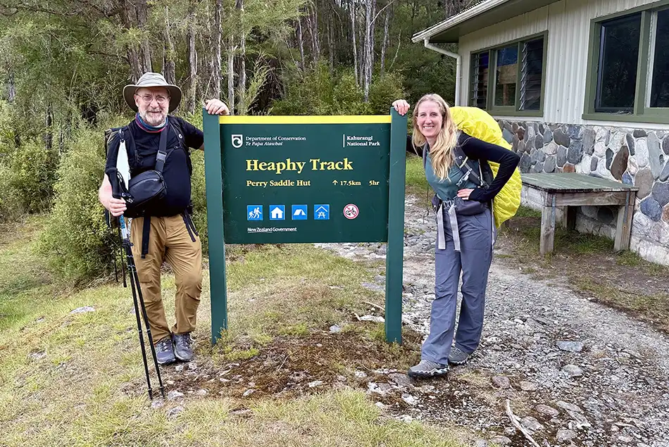Standing by Heaphy Sign at Brown Hut