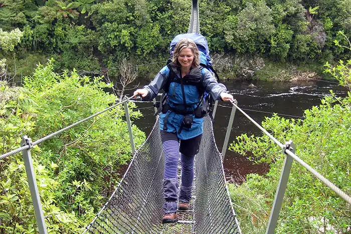 Lisa crossing the old Heaphy Track bridge in 2012