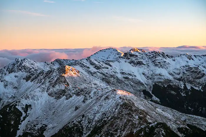 Early morning light on high peaks of Kahurangi National Park in winter