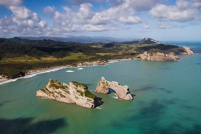 Scenic flight view of Archway Islands, Wharariki, Golden Bay