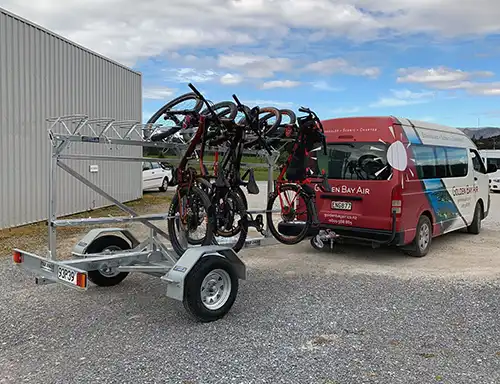 Golden Bay Air van with bike trailer
